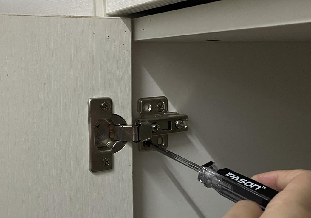 how to adjust old cabinet door hinges