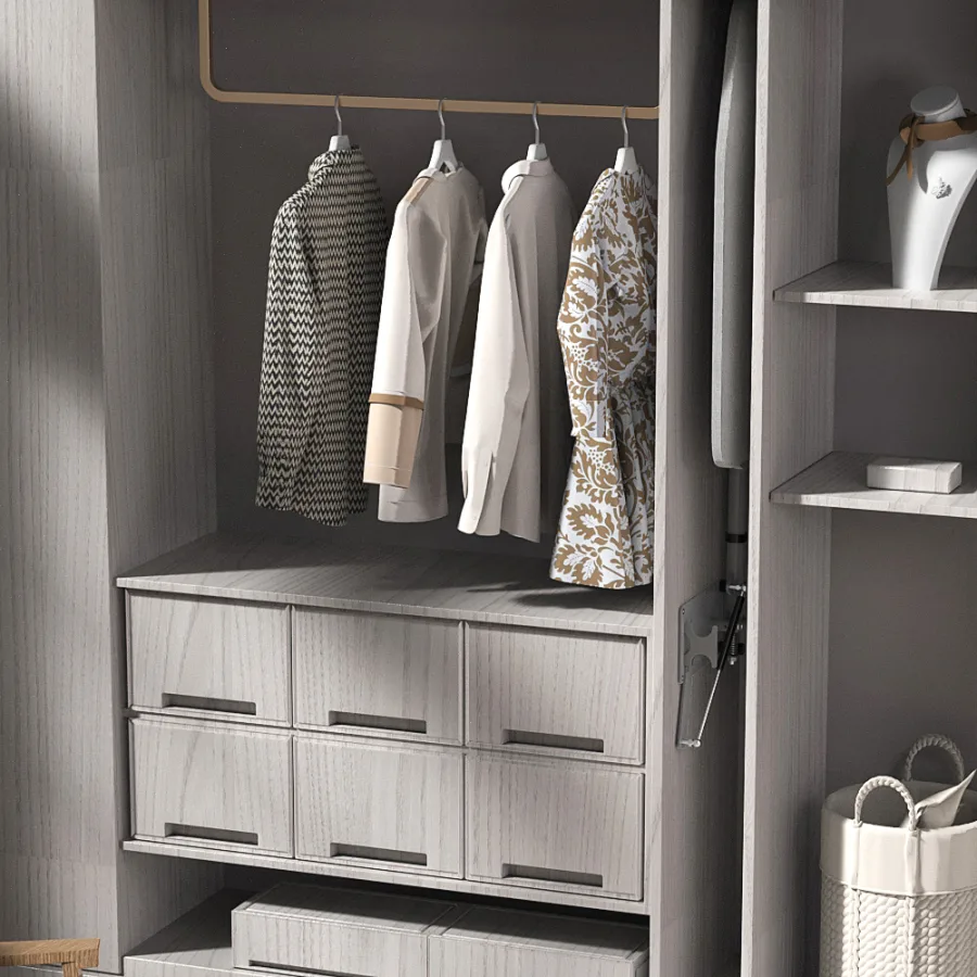 Built-in ironing board folded vertically beside wardrobe drawers