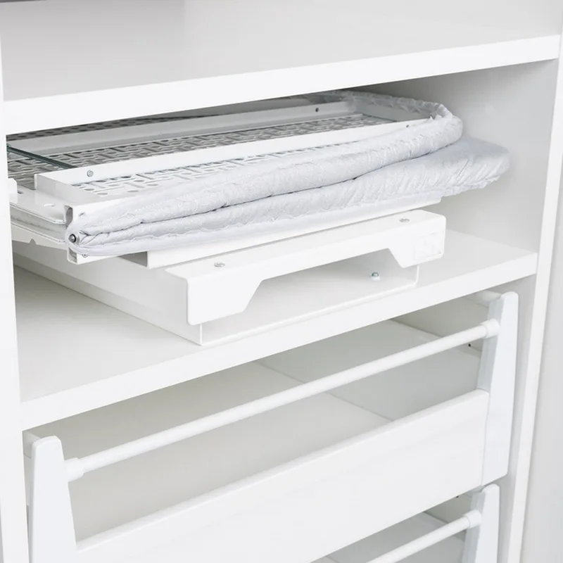Folding pull out ironing board stored inside cabinet